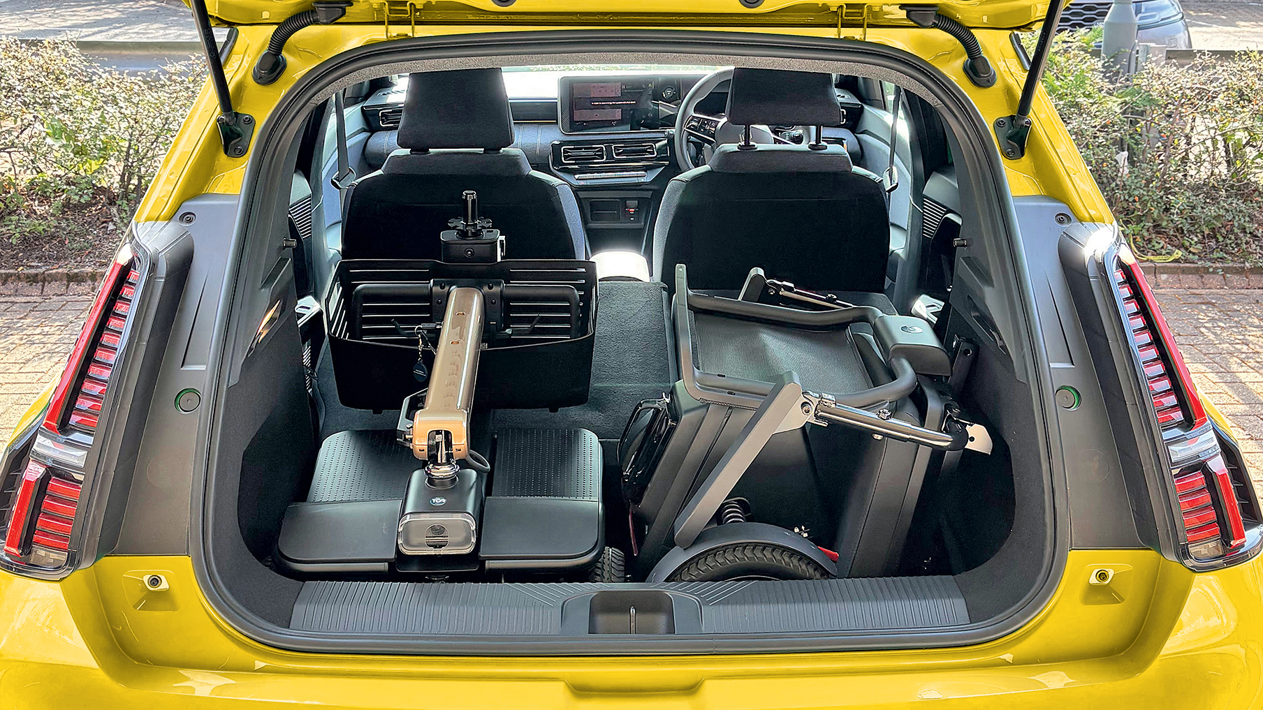 Mobility scooter in the boot of a Renault 5.jpg