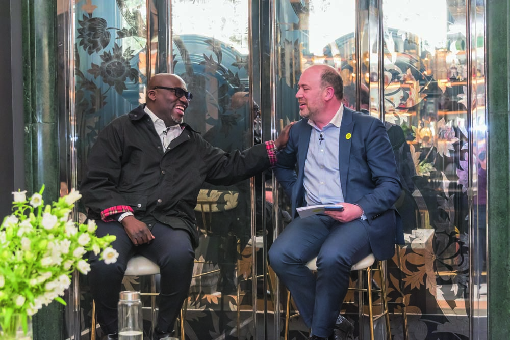 Edward Enninful OBE pictured sat, speaking with an interviewer at a BSME event in London