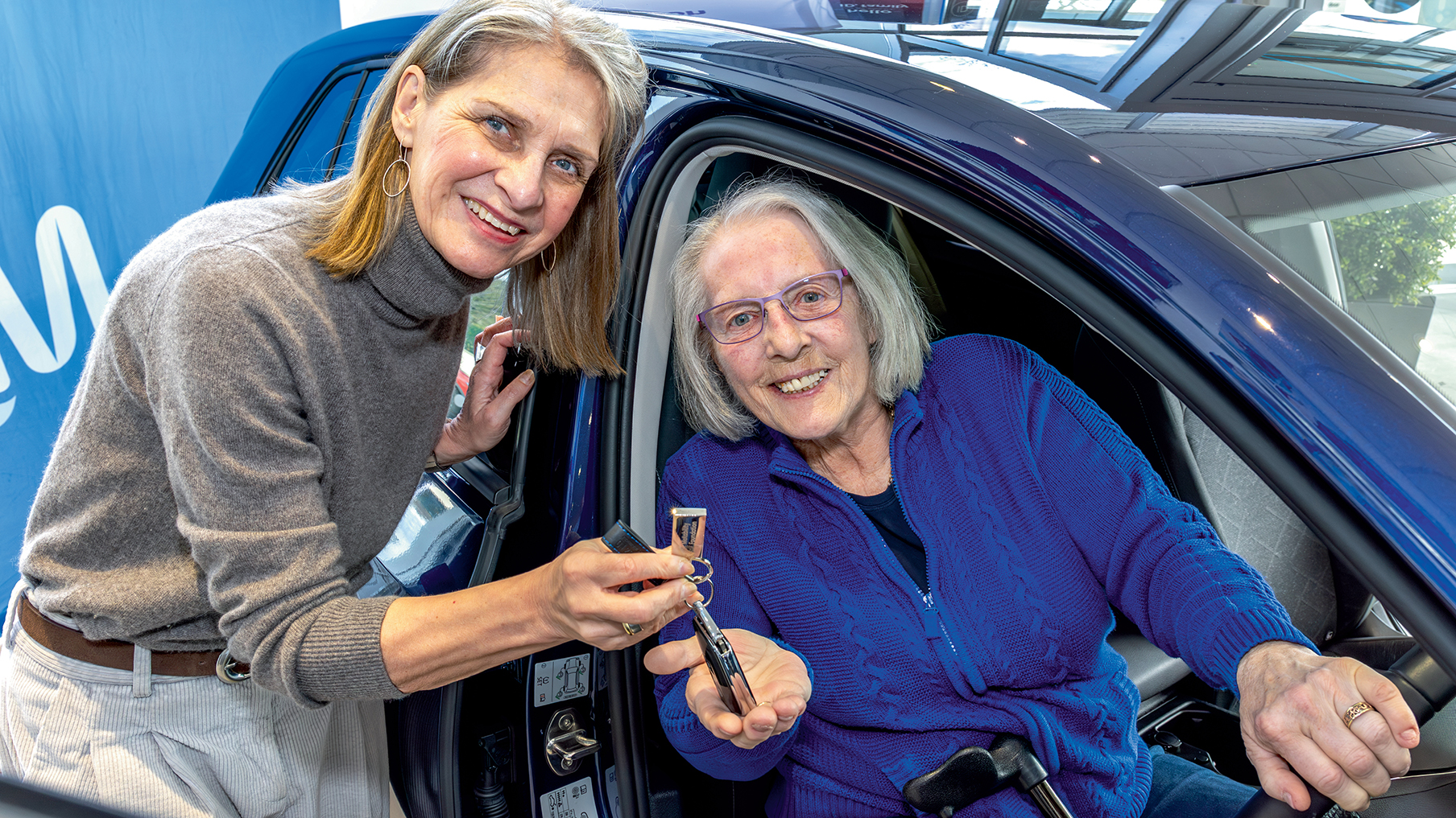Wera Hobhouse, Liberal Democrat MP for Bath hands Motability customer keys to her new car