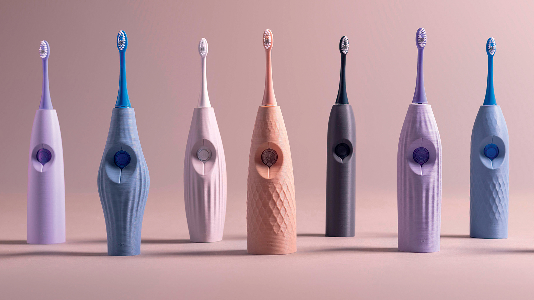 Toothbrushes lined-up side-by-side