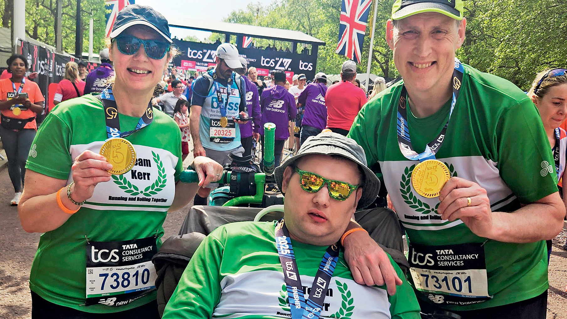 Team Kerr holding their medals at the London Marathon 2025