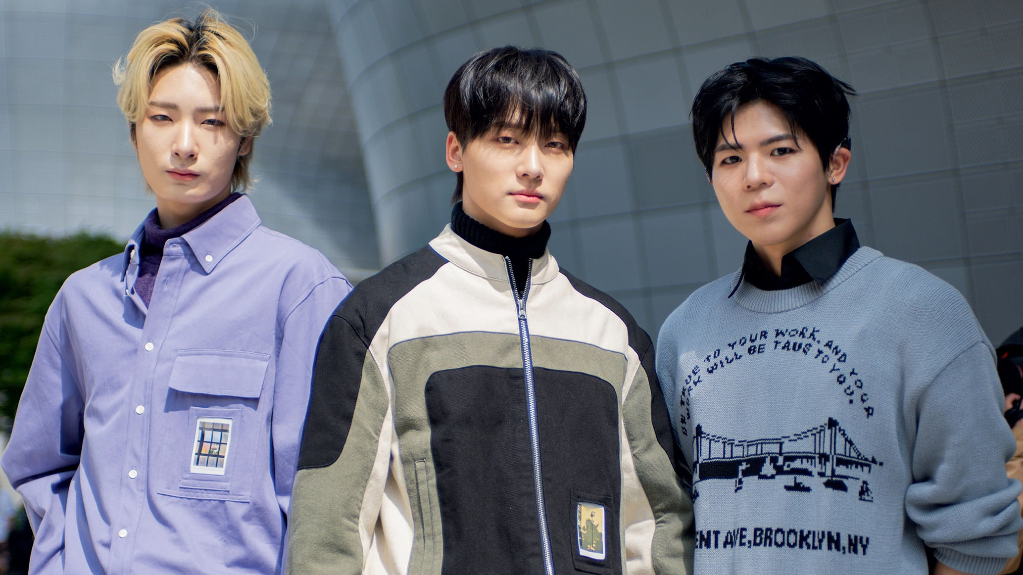 A photo of the three band members side-by-side