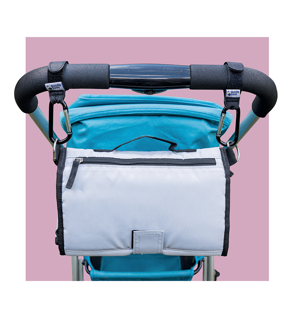 Velcro bag clips attached to a pram